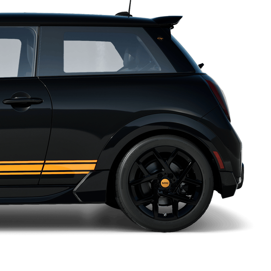 Side-view of the rear half of a MINI 1998 GT Edition. 