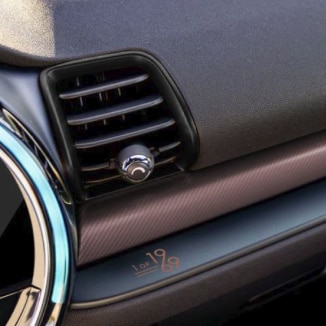 Closeup view of the décor surface dashboard on the interior of a MINI Cooper S Clubman ALL4 Final Edition.
