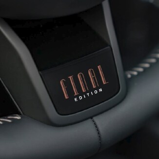 Closeup view of the Final Edition graphic printed on the spoke of the Nappa Leather steering wheel in a MINI Cooper S Clubman ALL4 Final Edition.